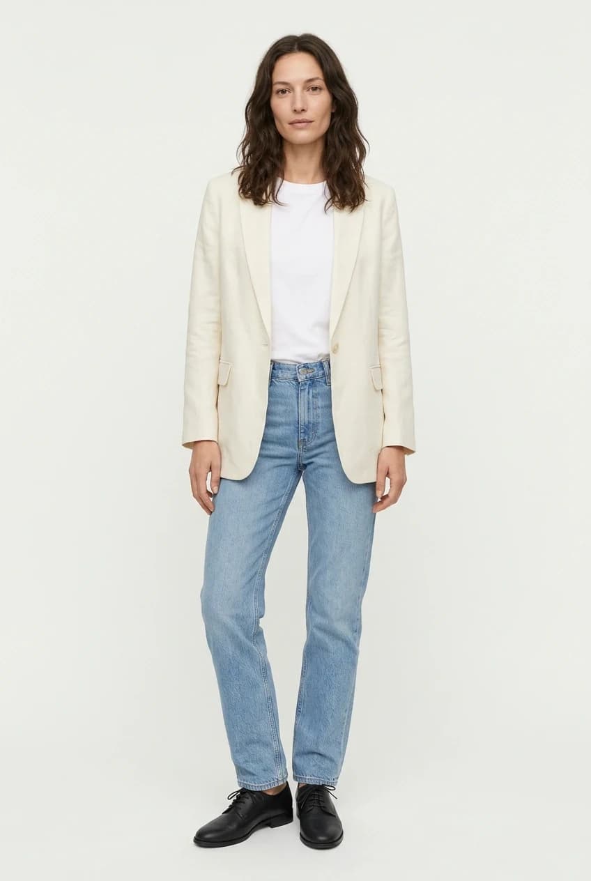 Full-body studio photo of the model, the first image: cream linen blazer, white tee, and light blue jeans