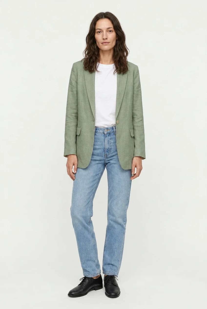 Full-body studio photo of the model, the blazer changed to sage green