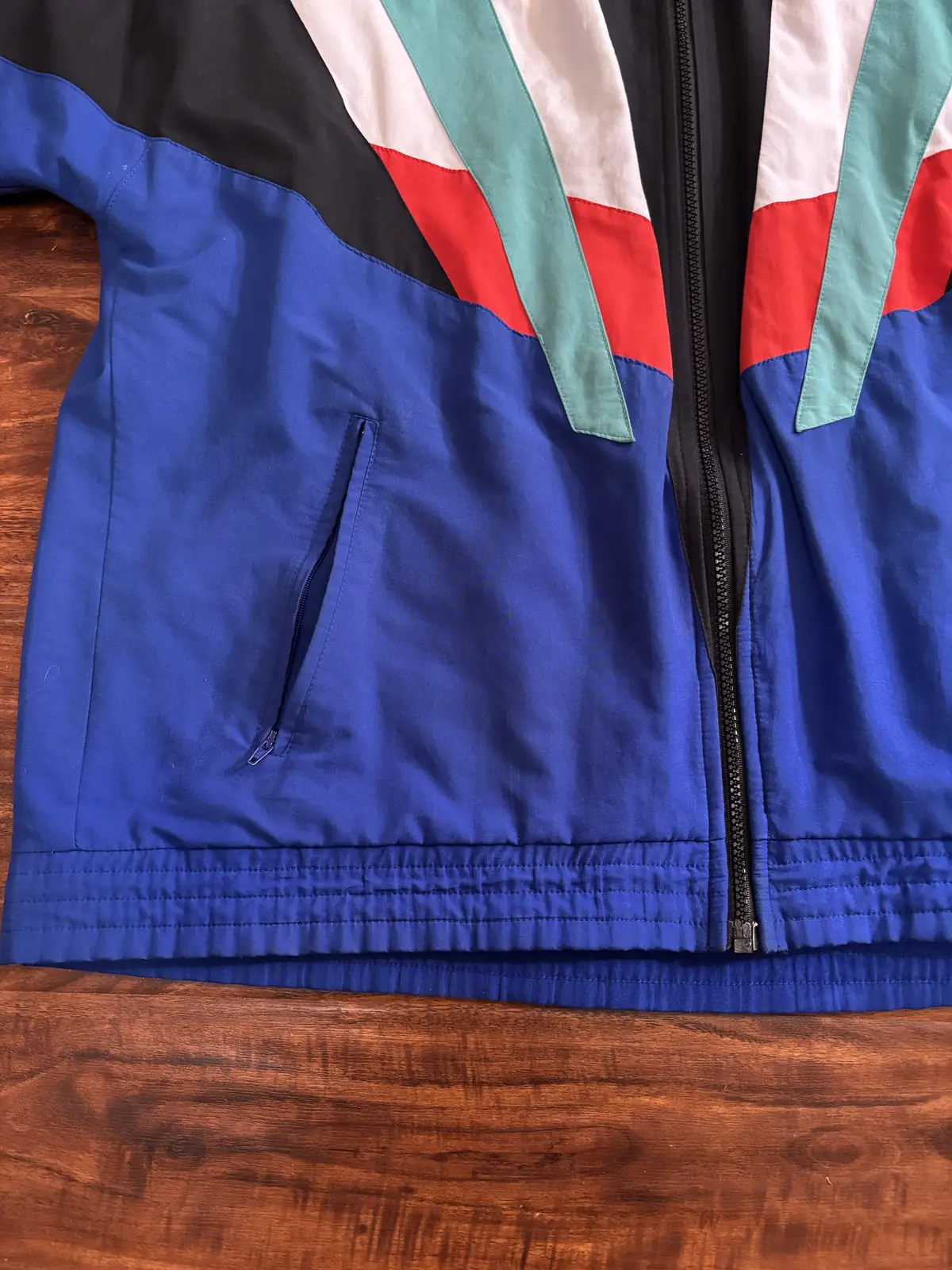 Close up of the jacket's waistband, laid flat