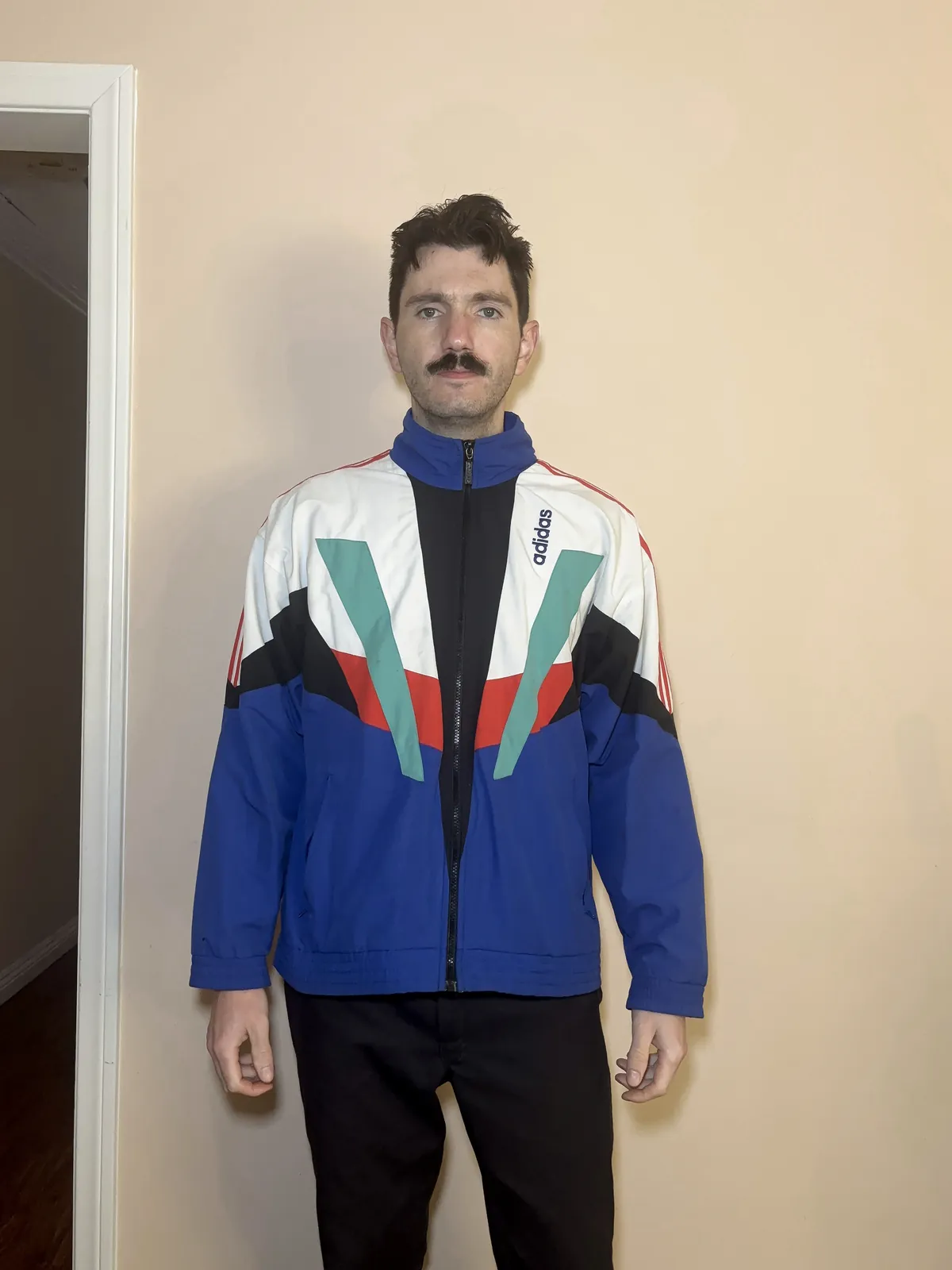 The jacket worn by a person, photographed from the front