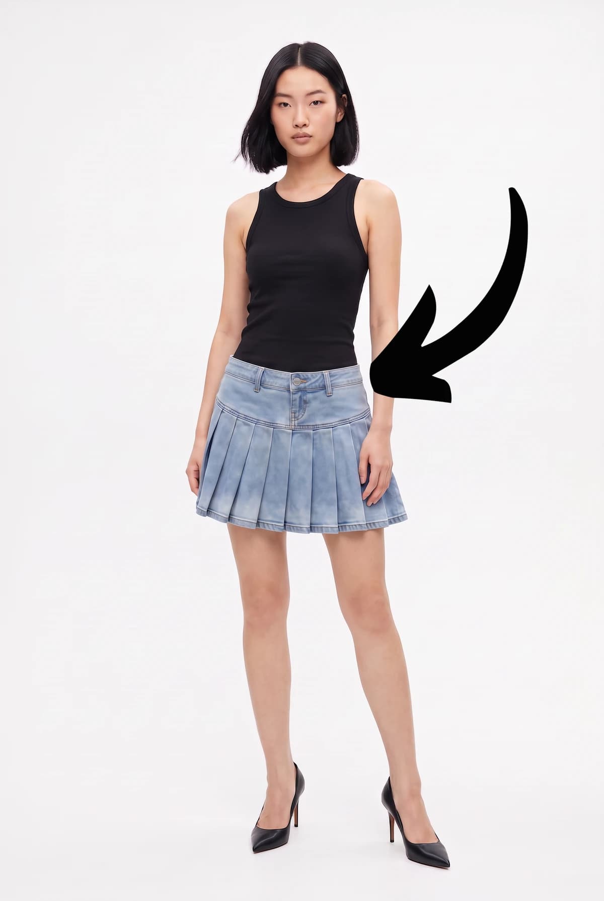 The same skirt now sitting lower on the model's hips