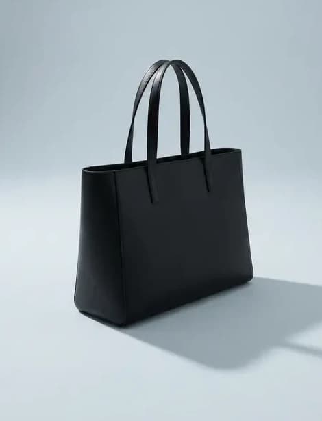 A black leather tote bag from Elements
